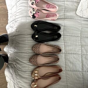 4 pairs of barely worn mini Melissa shoes